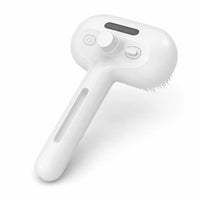 Cat steam grooming brush, angled view of brush head